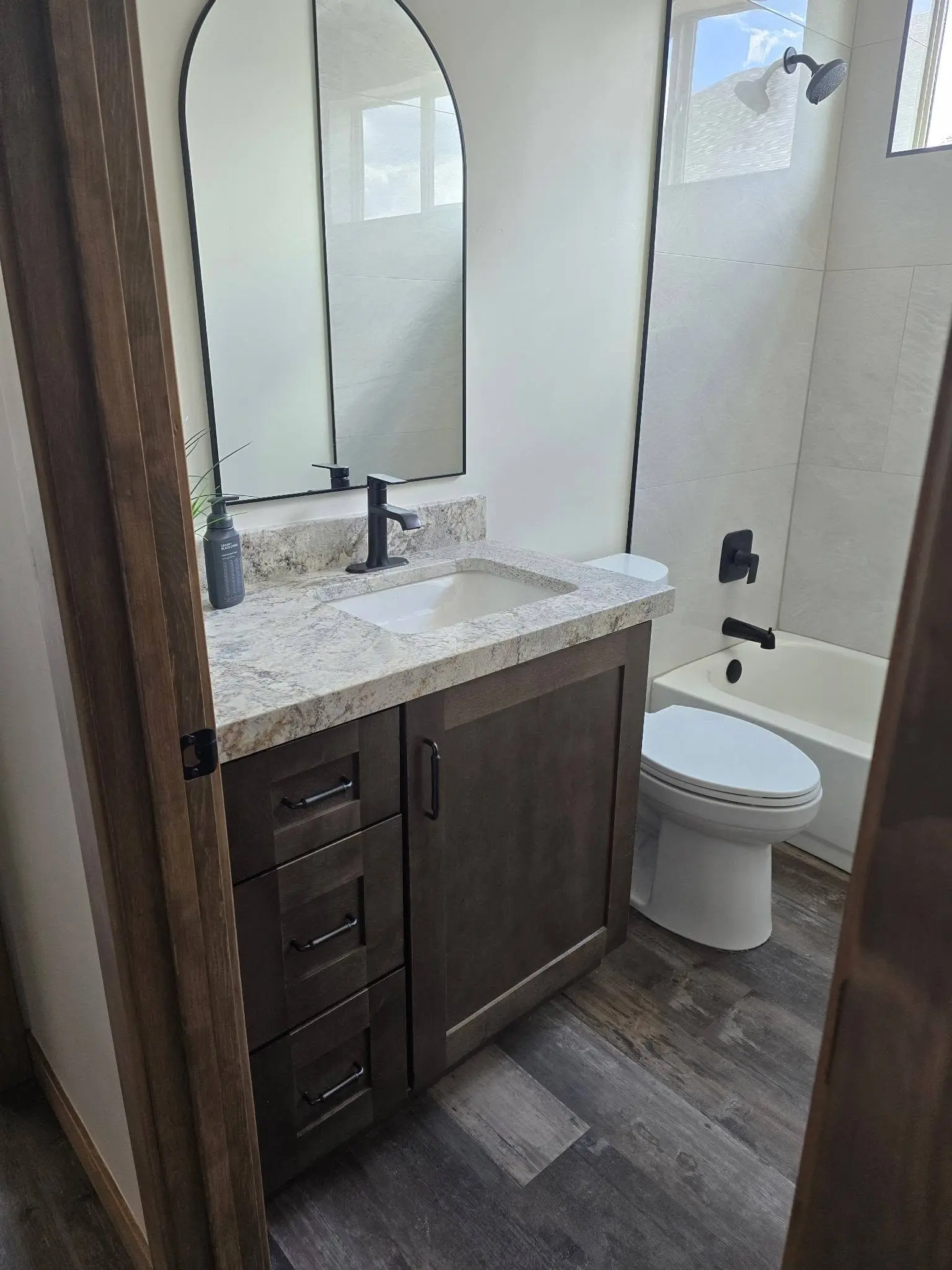 Installed bathroom vanity with shaker doors and drawers